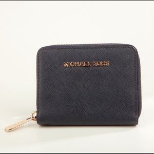 Hand size Michael Kors wallet